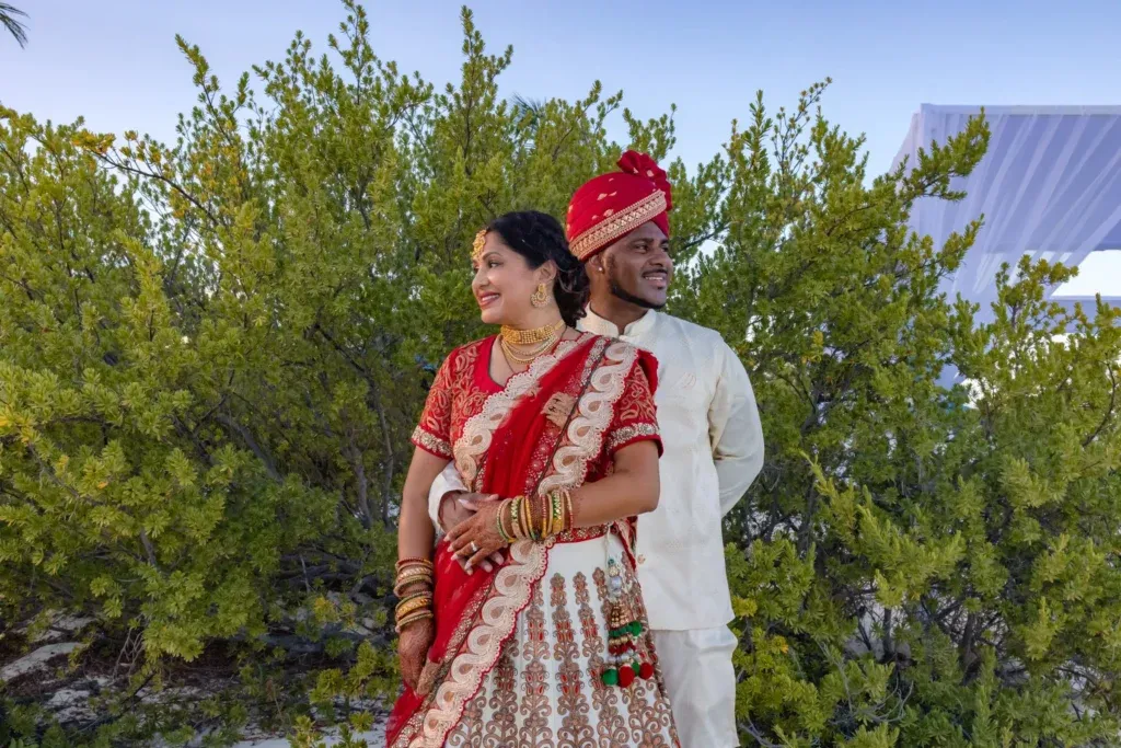 Cancun wedding photographer capturing a traditional Indian wedding ceremony on the beach at Royalton Splash Riviera Maya